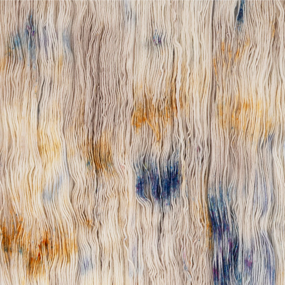 Sysleriget hand dyed yarn in single ply merino wool in the color Blueberry Swirl.