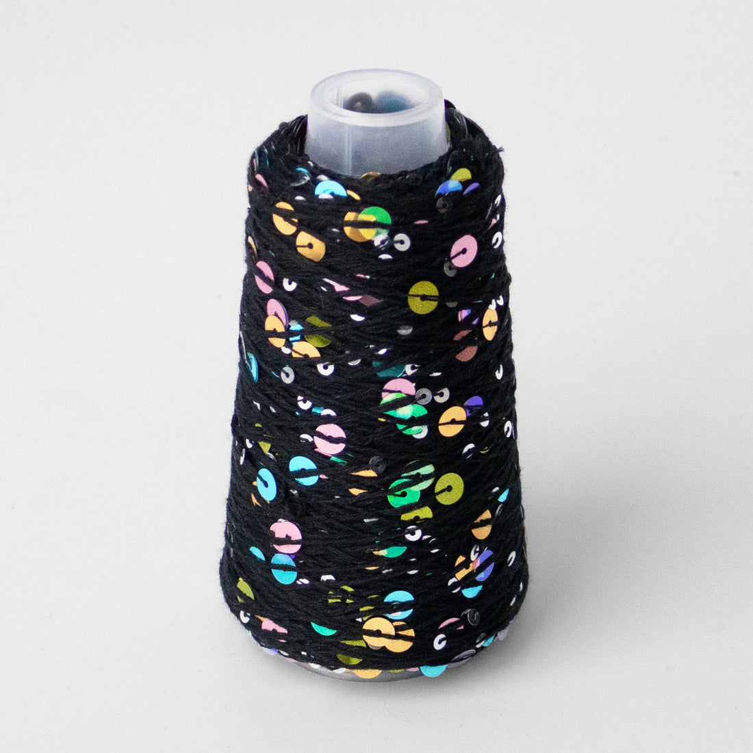 Sysleriget Sequins yarn on cotton base in the color 122 Multisort.