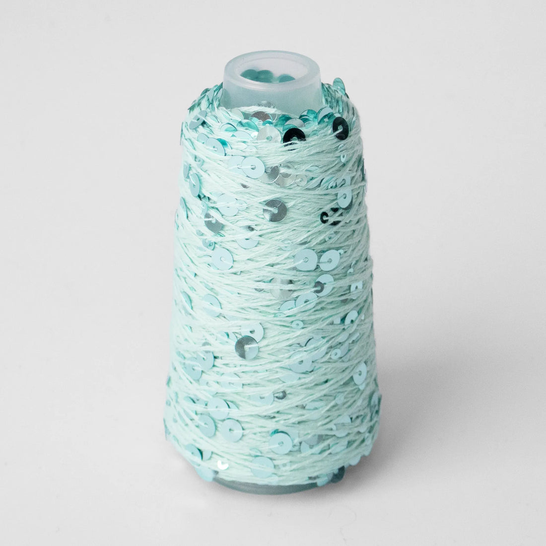 Sysleriget Sequins yarn on cotton base in the color 13 Aqua.